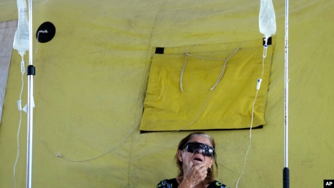 A dengue patient receives treatment at a provisional military field hospital, in the Ceilandia neighborhood of Brasilia, Brazil, Feb. 16, 2024.