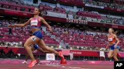 FILE - Sydney McLaughlin, of the United States, wins the women's 400-meter hurdles at the 2020 Summer Olympics, in Tokyo, Japan, Aug. 4, 2021.