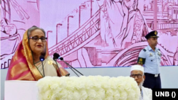 বঙ্গবন্ধু আন্তর্জাতিক সম্মেলন কেন্দ্রে জাতীয় বিশ্ববিদ্যালয়ের অধিভুক্ত কলেজগুলোর অধ্যক্ষ সম্মেলন এবং বৃত্তি প্রদান অনুষ্ঠানে বক্তব্য রাখছেন শেখ হাসিনা। ১৬ জুলাই, ২০২৩। 