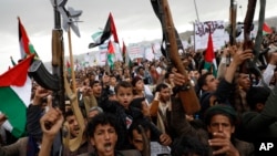 Houthi supporters attend a rally against the U.S.-led strikes against Yemen and in the support of Palestinians in the Gaza Strip, in Sanaa, Yemen, Feb. 16, 2024.