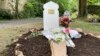 Flowers lie at the grave of Nahel Merzouk on July 5, 2023, in a cemetery in Nanterre, a Paris suburb. Nahel's death at the hands of police caused five nights of unrest in France.