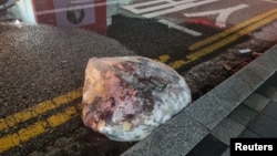 FILE - A plastic bag carrying what appeared to be trash that crossed inter-Korean border with a balloon believed to have been sent by North Korea, is pictured in Seoul, in this picture provided and released by the Defense Ministry, June 2, 2024.