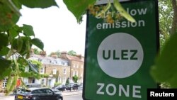 Signage indicates the boundary of London's Ultra Low Emissions Zone (ULEZ) zone along the North Circular Road ahead of proposed upcoming expansion, in London, Britain, June 26, 2023.