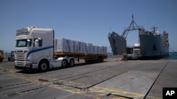 Kamion sa humanitarnom pomoći na pristaništu u Gazi (Foto: AP/Leo Correa)