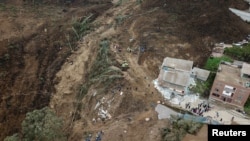Una vista muestra el sitio de un deslizamiento de tierra en Alausi, Ecuador 27 de marzo de 2023. REUTERS/Karen Toro