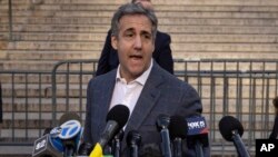 Michael Cohen speaks to members of media as he arrives for former President Donald Trump's civil business fraud trial at New York Supreme Court, Oct. 24, 2023.