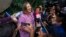 FILE - Senator Xochitl Galvez, an opposition presidential hopeful, speaks to the press after registering her name as a candidate in Mexico City, July 4, 2023.
