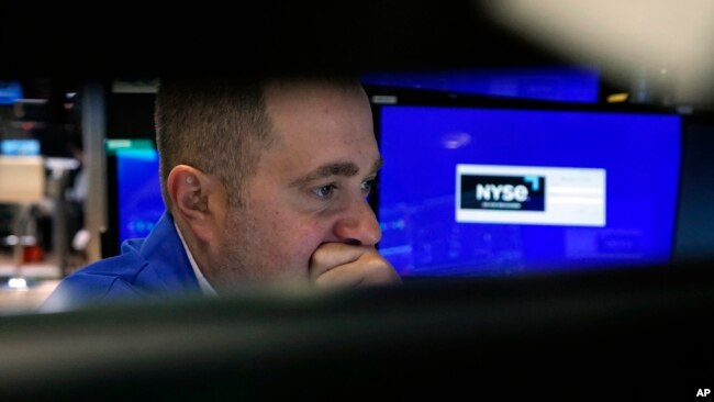 Specialist Gennaro Saporito works on the floor of the New York Stock Exchange, Nov. 1, 2023. U.S. stocks are drifting Wednesday as Wall Street waits to hear what will come out of the Federal Reserve's latest announcement on interest rates.
