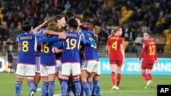 Japan's Mina Tanaka celebrates with teammates after scoring her side's 4th goal during the Women's World Cup Group C soccer match between Japan and Spain in Wellington, New Zealand, July 31, 2023. 