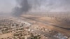 FILE - Smoke rises over the city as army and paramilitaries clash in power struggle, in Khartoum, Apr. 15, 2023 in this picture obtained from social media. (Instagram @lostshmi/via Reuters) 