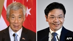 စင်္ကာပူ ဝန်ကြီးချုပ် Lee Hsien Loong (ဝဲ)၊ ဝန်ကြီးချုပ်နေရာဆက်ခံမယ့် ဒုတိယဝန်ကြီးချုပ် Lawrence Wong