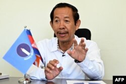 In this photo taken on July 5, 2023, Rong Chhun, vice president of the opposition Candlelight Party (CP) speaks during an interview at his party's headquarters in Phnom Penh.