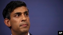 FILE - Britain's Prime Minister Rishi Sunak looks on during a news conference at Number 9 Downing Street on public sector pay, in London, July 13, 2023.