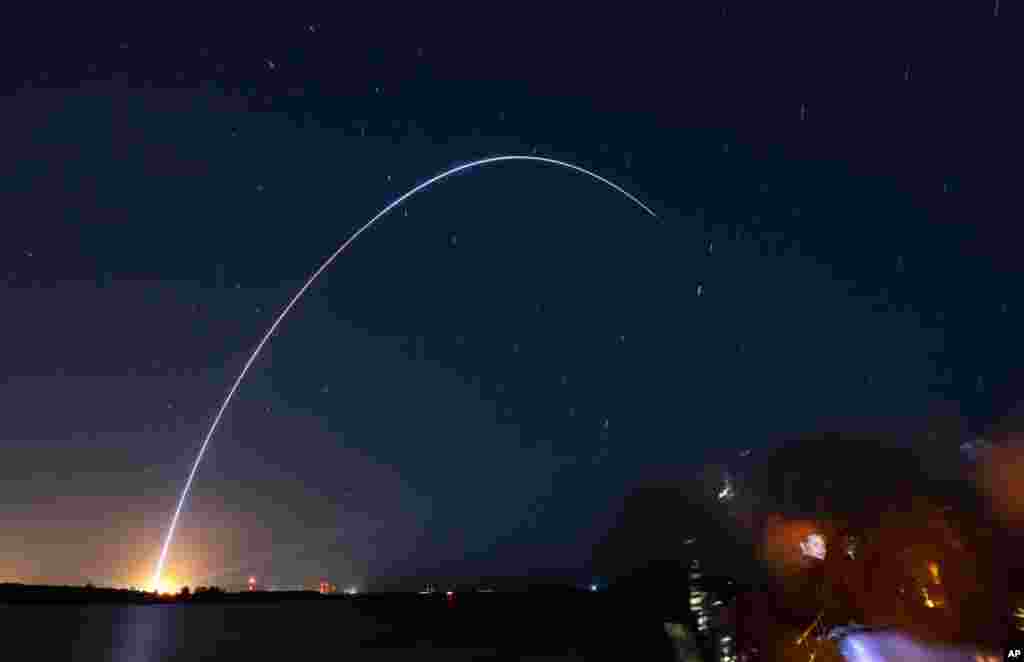 Spectators at Jetty Park in Cape Canaveral, Fla., watch as Terran I, a 3D-printed rocket by Relativity Space, lifts off from Cape Canaveral Space Force Station. The first stage did its job following liftoff from Cape Canaveral Space Force Station and separated as planned. But the upper stage appeared to ignite and then shut down, sending it crashing into the Atlantic.