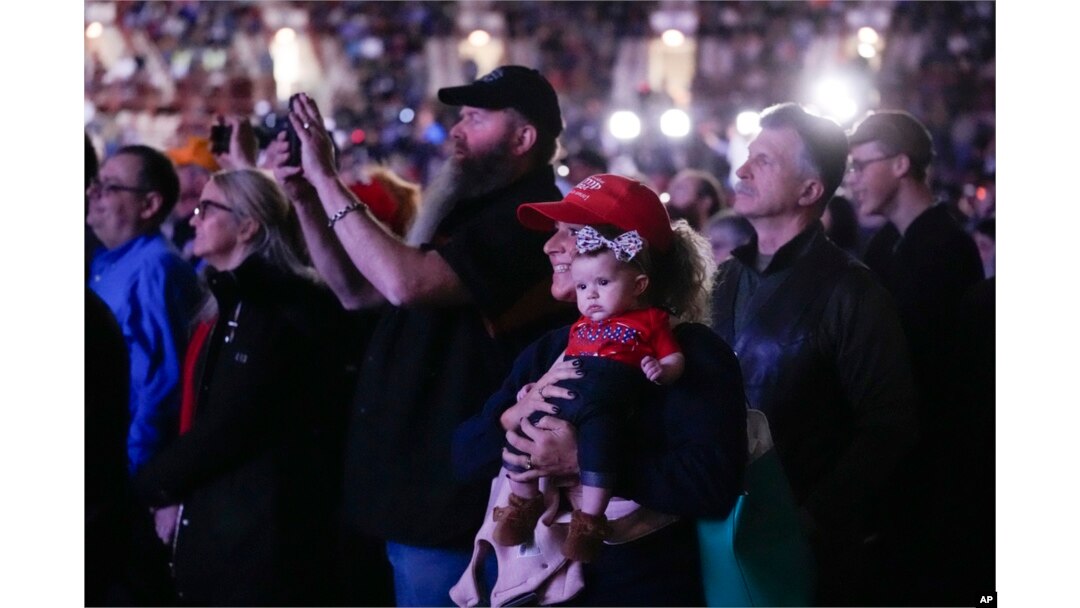 Supporters listen as Republican presidential candidate and former President Donald Trump speaks at the National Rifle Association's Presidential Forum in Harrisburg, Pennsylvania, Feb. 9, 2024.