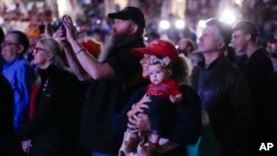 Supporters listen as Republican presidential candidate former President Donald Trump speaks at the National Rifle Association's Presidential Forum in Harrisburg, Pa., Feb. 9, 2024.