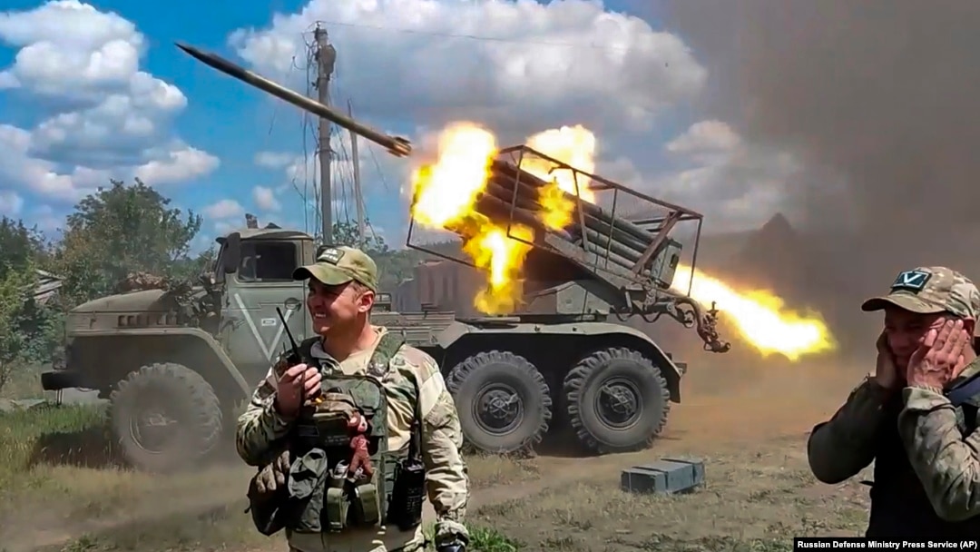 FILE - Russian soldiers fire from a BM-21 "Grad" self-propelled 122mm multiple rocket launcher at an undisclosed location in Ukraine, July 1, 2024.