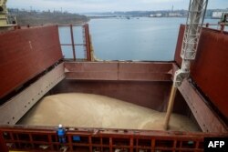 FILE - U.N.-chartered vessel MV Valsamitis is loaded to deliver Ukrainian wheat to Kenya and Ethiopia, at the port of Chornomorsk on Ukraine's Black Sea coast, Feb. 18, 2023.