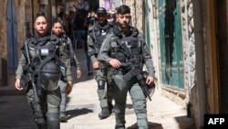 Israeli security forces patrol the area around the residence of the Palestinian Sub Laban family following their eviction from their home in the Muslim Quarter in Jerusalem's old city to make way for Jewish settlers, on July 11, 2023.