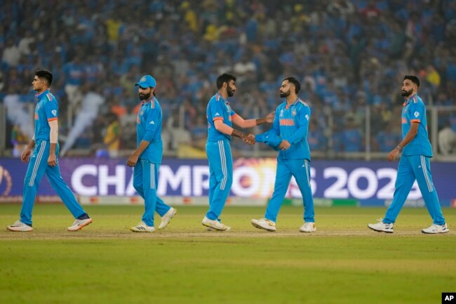 Indian players react after they lost to Australia by 6 wickets during the ICC Men's Cricket World Cup final match in Ahmedabad, Nov. 19, 2023.