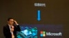 A presenter talks about Microsoft in the Information Age during the World Artificial Intelligence Conference in Shanghai, July 6, 2023. A China-based hacking group breached email accounts linked to government agencies, Microsoft Corp. said in a blog post published July 11.