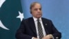 FILE - Pakistani Prime Minister Shehbaz Sharif attends a meeting in Astana, Kazakhstan, July 3, 2024. Sharif's government has supported Pakistan's move to allow the Inter-Services Intelligence, or ISI, to monitor citizens' phone calls.