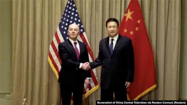 Chinese Public Security Minister Wang Xiaohong, right, held a meeting with U.S. Homeland Security Secretary Alejandro Mayorkas in Vienna, Feb. 18, 2024. (Screenshot of China Central Television via Reuters Connect)