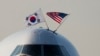 The aircraft carrying South Korea's President Yoon Suk Yeol taxis on the tarmac July 10, 2024, at Andrews Air Force Base, Md. 
