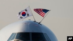 The aircraft carrying South Korea's President Yoon Suk Yeol taxis on the tarmac July 10, 2024, at Andrews Air Force Base, Md. 