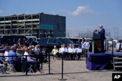FILE - President Joe Biden speaks about climate change and clean energy at Brayton Power Station, July 20, 2022, in Somerset, Mass.