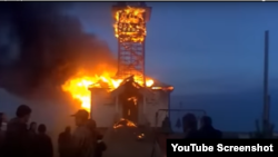 Screenshot of a YouTube video showing a fire at the Church of the Kazan Icon of the Mother of God in Ilyinka, Russia, uploaded on January 22, 2013. Russia's U.K. Embassy and others claimed the video showed a church that had recently been burned down in Ukraine. 