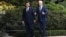 FILE — Chinese President Xi Jinping, left, and U.S. President Joe Biden walk together at the Filoli Estate in Woodside, California, during the Asia-Pacific Economic Cooperation leaders' week, Nov. 15, 2023. The two are scheduled to have a phone call in the spring.