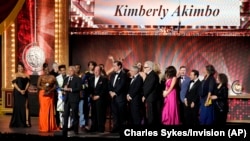 David Stone and members of the company of "Kimberly Akimbo" accept the award for best musical at the 76th annual Tony Awards on June 11, 2023, at the United Palace theater in New York.