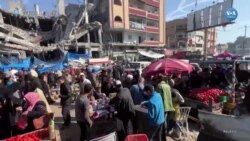 Ateşkesi fırsat bilen Gazzeliler enkazın arasında pazar alışverişi yaptı 