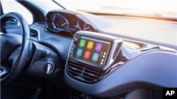 FILE - The number of AM radio stations in the United States is dwindling and could get smaller: Some automakers want to kick AM off their dashboard radios.