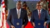 U.S. Secretary of Defense Lloyd Austin, left, and Kenya's Cabinet Secretary for Defense Aden Duale hold copies of a Defense Cooperation Agreement in Nairobi, Kenya, Sept. 25, 2023. 