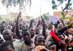 Supporters of mutinous soldiers demonstrate in Niamey, Niger, on July 27 2023.