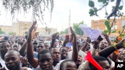 Supporters of mutinous soldiers demonstrate in Niamey, Niger, on July 27 2023. 