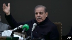 Pakistan's former Prime Minister Shehbaz Sharif speaks during a press conference in Lahore, Pakistan, Feb. 13, 2024. Sharif was nominated as the country's next prime minister after a key political party pledged support for his candidacy. 