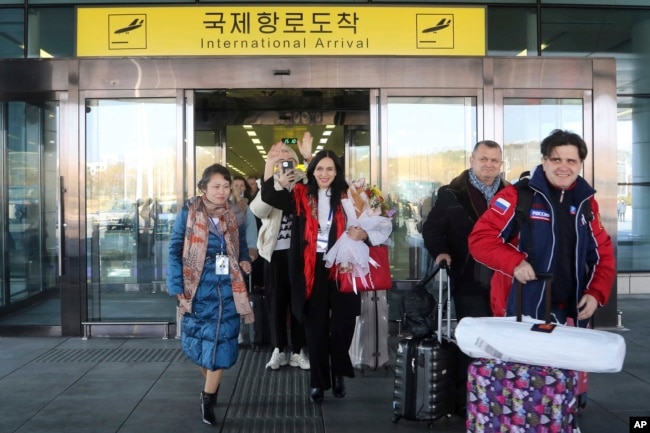A group of Russian tourists, likely the first foreign travelers from any country to enter North Korea since the pandemic arrive at the Pyongyang International Airport in Pyongyang, North Korea, Feb. 9, 2024.
