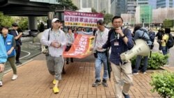 香港疫後首次遊行反對填海 警要求參加者掛號碼牌圍封鎖線 市民感難過