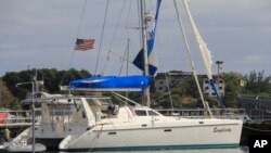 The yacht "Simplicity", that officials say was hijacked by three escaped prisoners with two people aboard, is docked at the St. Vincent and the Grenadines Coastguard Service Calliaqua Base, in Calliaqua, St. Vincent, Feb. 23, 2024.
