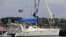 The yacht "Simplicity", that officials say was hijacked by three escaped prisoners with two people aboard, is docked at the St. Vincent and the Grenadines Coastguard Service Calliaqua Base, in Calliaqua, St. Vincent, Feb. 23, 2024.