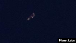 19일 북한 초도 북쪽 8km 해상을 촬영한 위성사진에 포착된 선박 2척. 사진=Planet Labs