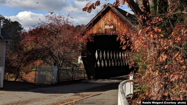 FILE - A covered bridge near Woodstock and Pomfret, Vermont during autumn.