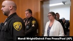 Jennifer Crumbley walks into an Oakland County courtroom before being found guilty on four counts of involuntary manslaughter on Feb. 6, 2024 in Pontiac, Michigan. (Mandi Wright/Detroit Free Press via AP/Pool)