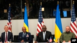 United States Secretary of Defense Lloyd Austin, second right, chairs a meeting of the Ukraine Defense Contact Group in the format of NATO defense ministers at NATO headquarters in Brussels, June 13, 2024.