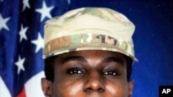 This family photo shows a portrait of American soldier Travis King displayed at the home of his grandfather Carl Gates, Wednesday, July 19, 2023, in Kenosha, Wis. (Family Photo via AP)