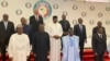 Nigeria President, Bola Ahmed Tinubu, second from left, poses , for a group photograph with other West Africa leaders after a meeting in Abuja Nigeria, July 30, 2023. 