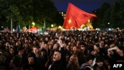 Demonstrators take part in a rally against far-right after the announcement of the results of the first round of parliamentary elections, at Place de la Republique in Paris, France, June 30, 2024.